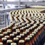 AB InBev acusa a CCU de infringir acuerdo de 2008 en Chile y la lleva al TDLC 3 Linea envasado AB InBev