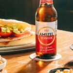 Cerveza Amstel junto a un esmorzar valenciano tradicional, Comunidad Valenciana