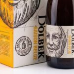 Botella y estuche de D Olbek Saison Belge de guarda en barrica de roble frances